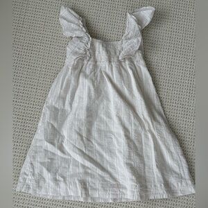 Cream Kids Dress with Ruffle Sleeves and metallic stripes